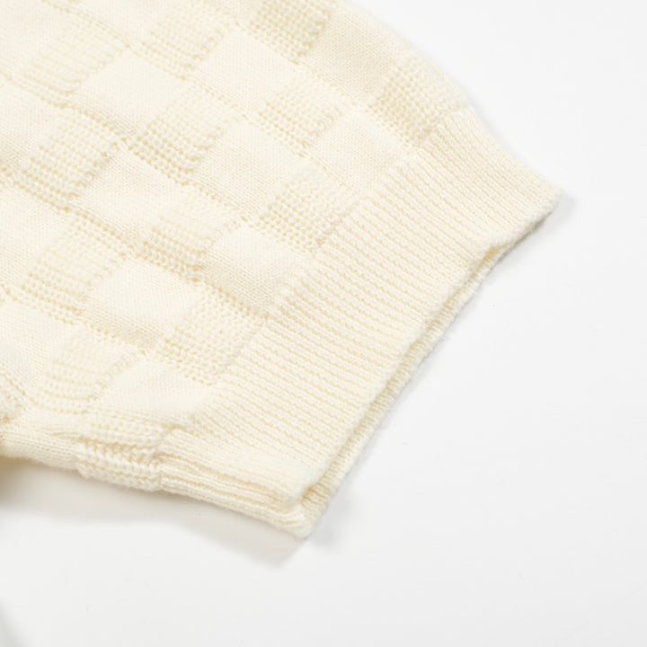 Polo col V homme blanc abricot texture rétro