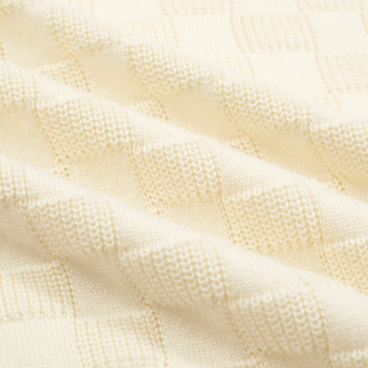 Polo col V homme blanc abricot texture rétro