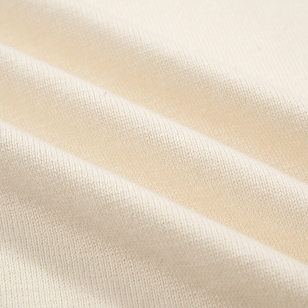 Polo de punto de crema moda de 60 años para hombres - moldura de punta negra