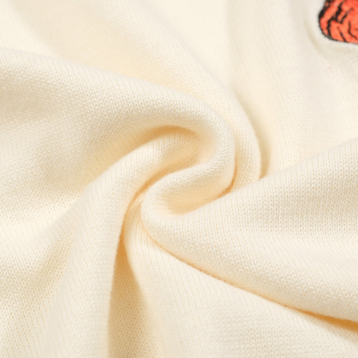Men’s Cream Knitwear – Embroidered animal with Orange Trim