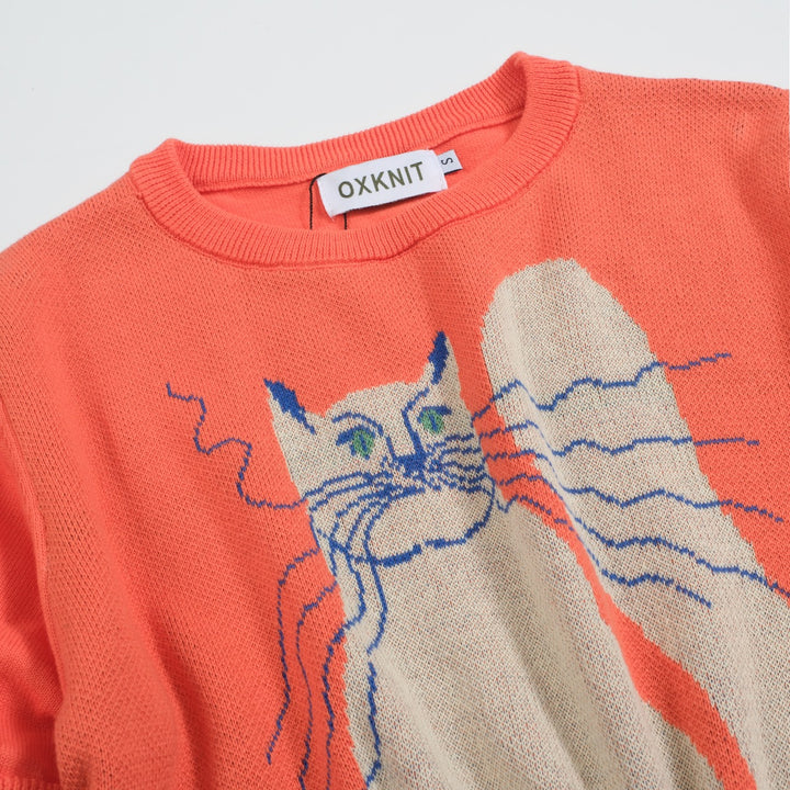 Camiseta feminina de malha jacquard gatinho laranja com comprimento cortado desenhado por Agathe Singer