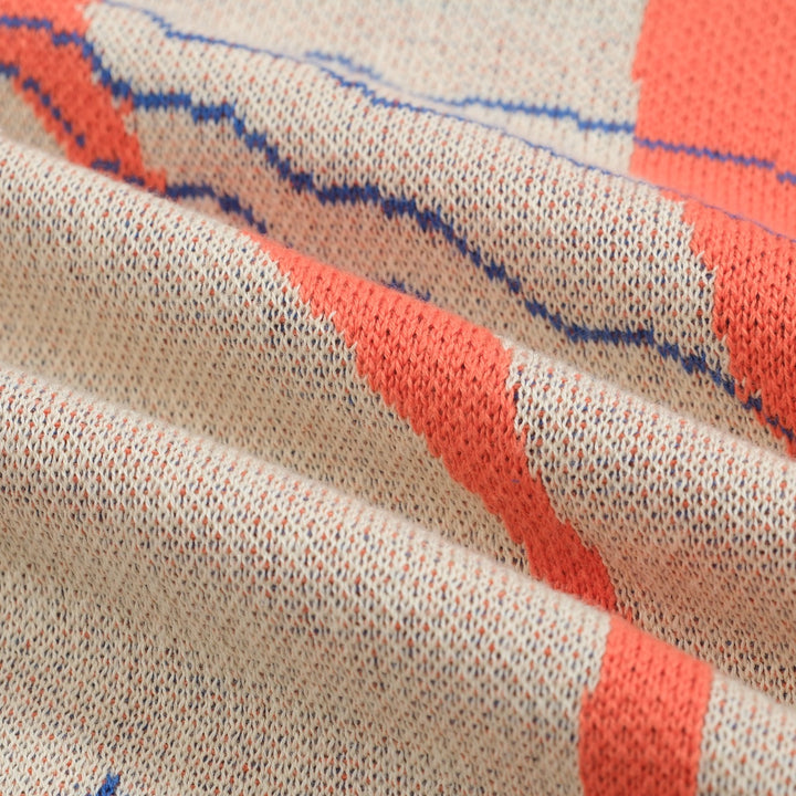 Camiseta feminina de malha jacquard gatinho laranja com comprimento cortado desenhado por Agathe Singer