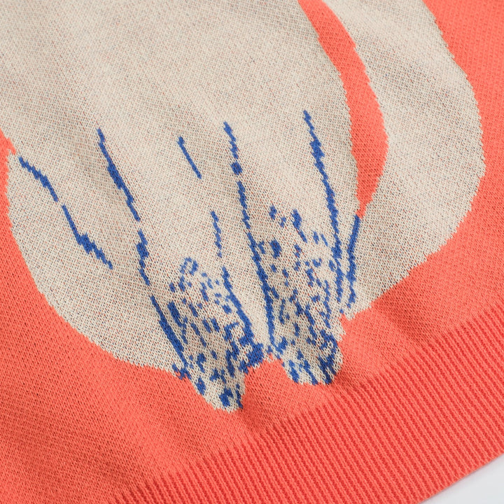 Camiseta feminina de malha jacquard gatinho laranja com comprimento cortado desenhado por Agathe Singer