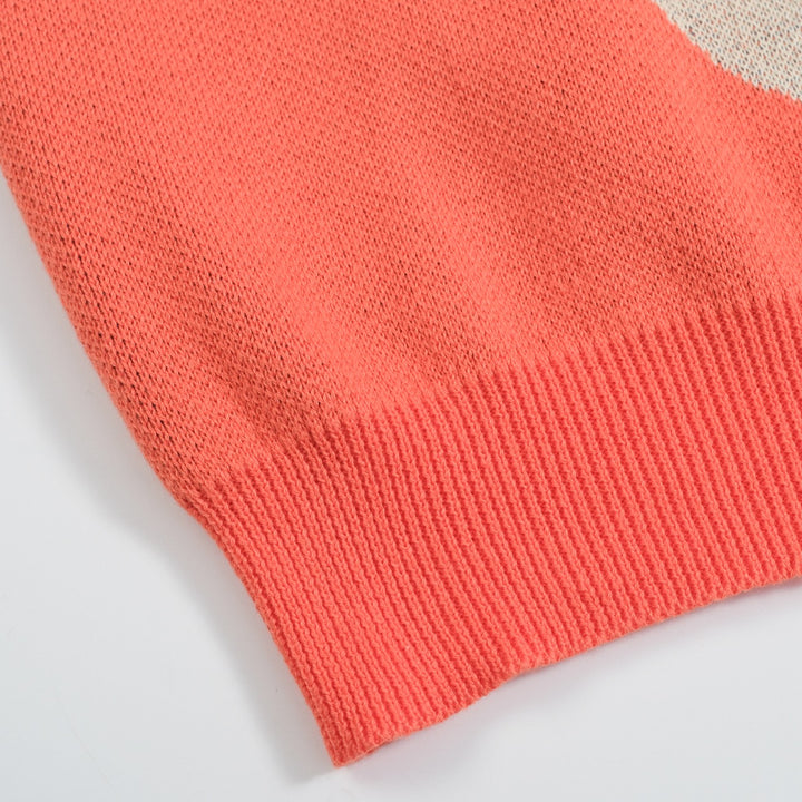 Camiseta feminina de malha jacquard gatinho laranja com comprimento cortado desenhado por Agathe Singer