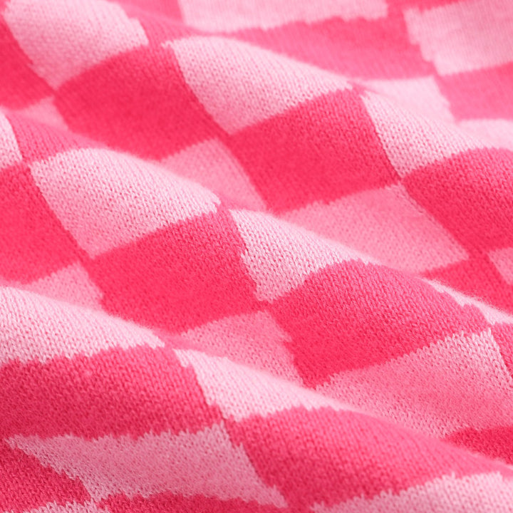 Retro-Strickpolo für Herren – Vintage-Rosa-Schachbrettmuster mit Leopardengrafik