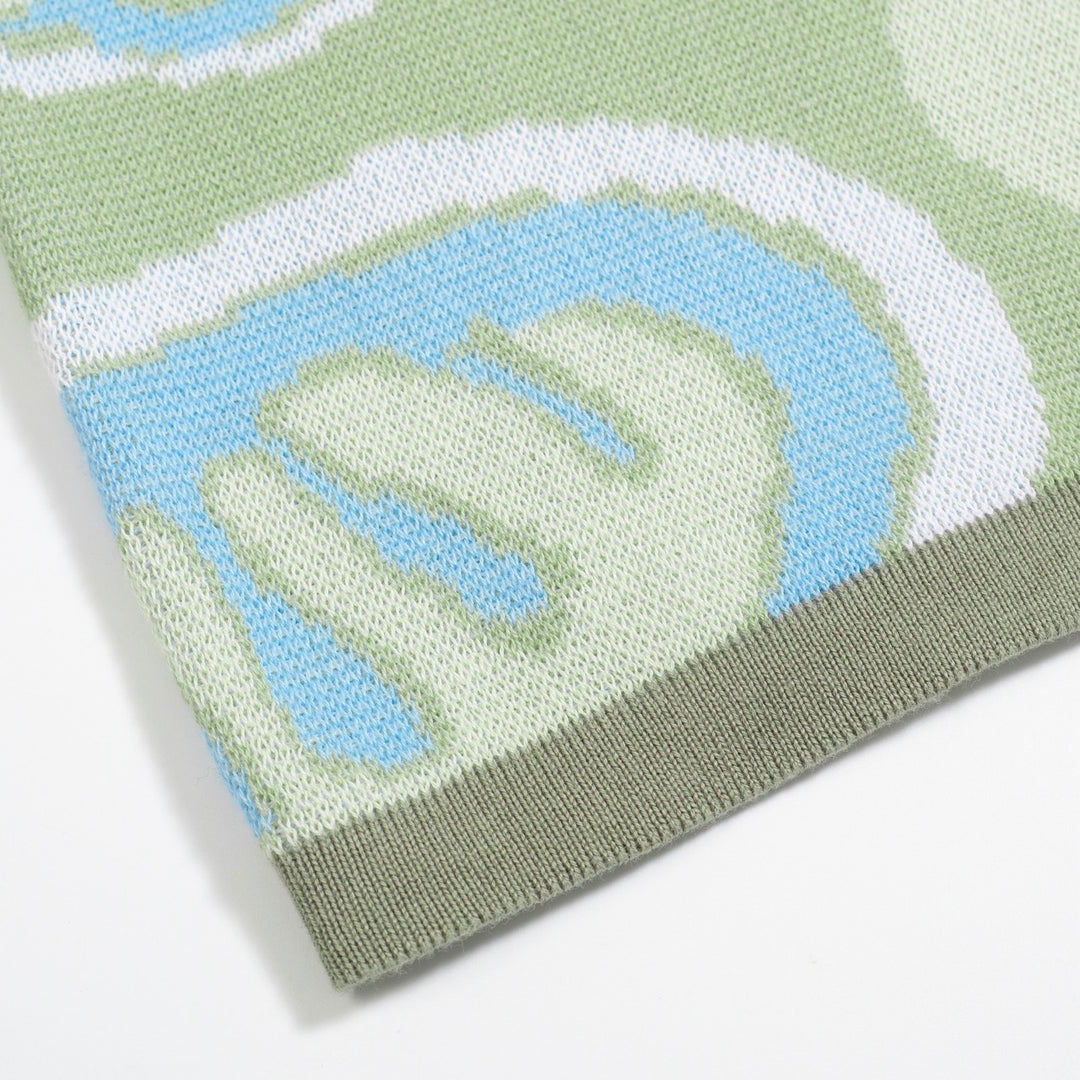 Kvinnors gröna blomstickade set med blått och vitt blommönster