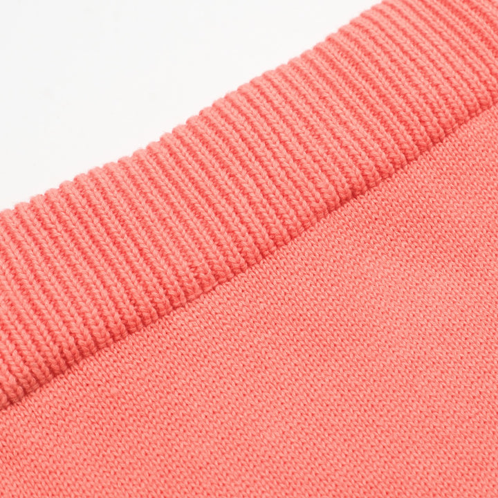 Kvinders retro-farveblokstrikkesæt med bløde pasteller i pink, blå og creme