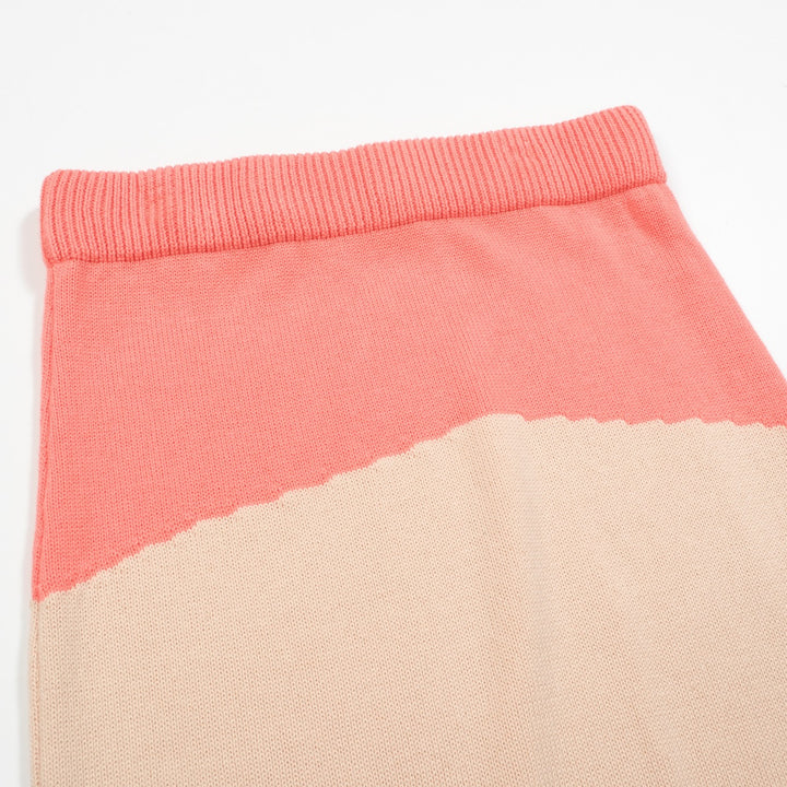 Kvinders retro-farveblokstrikkesæt med bløde pasteller i pink, blå og creme