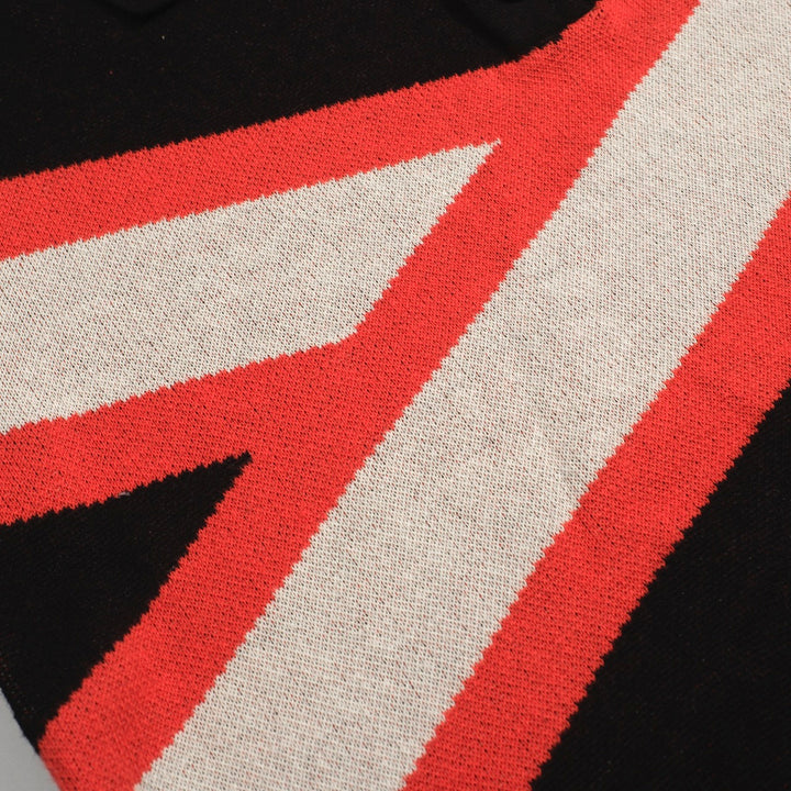 Polo homme noir tricoté à rayures rétro à la mode