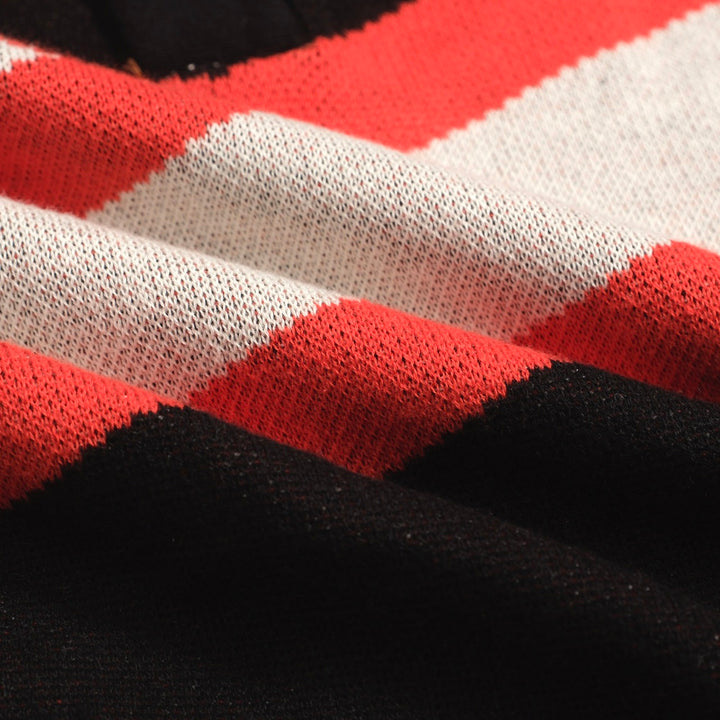 Polo homme noir tricoté à rayures rétro à la mode