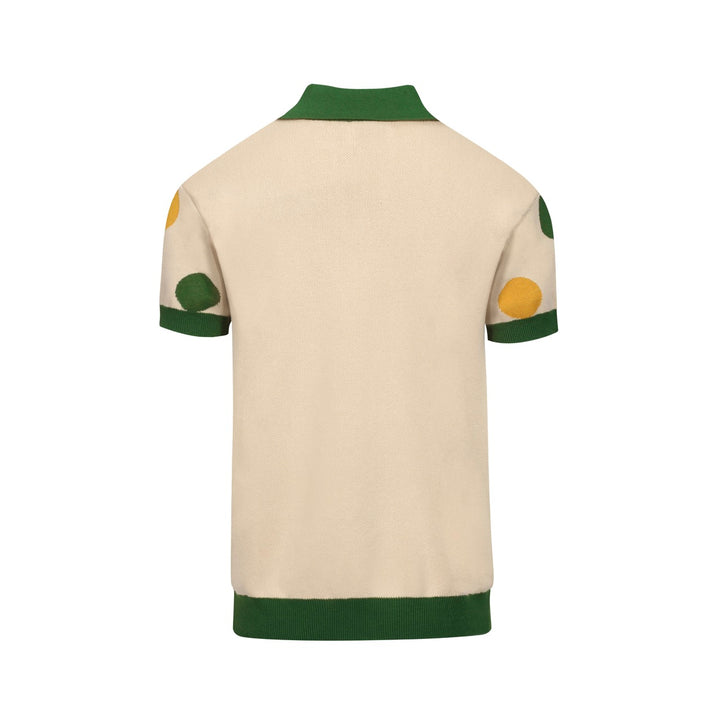 Polo masculino de malha verde com bolinhas e decote em V