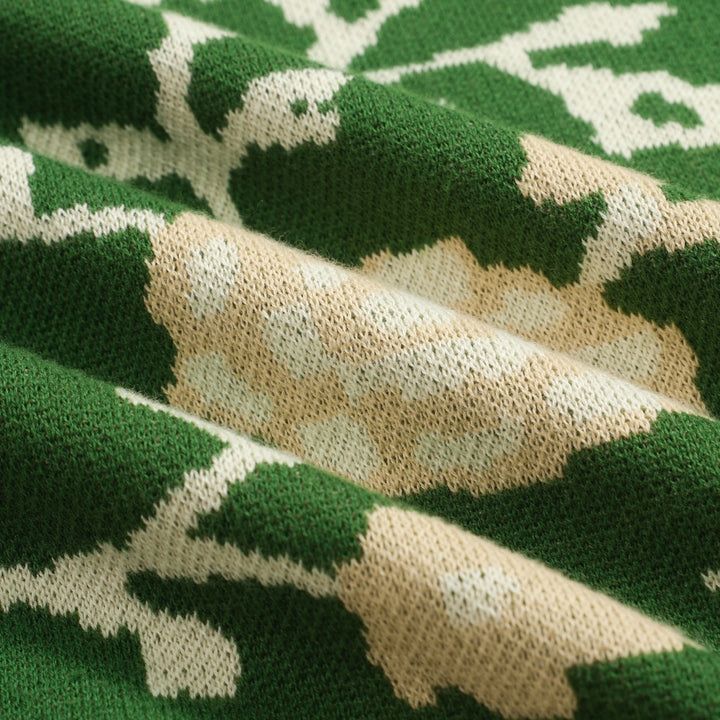 Polo da uomo in maglia verde jacquard floreale con scollo a V