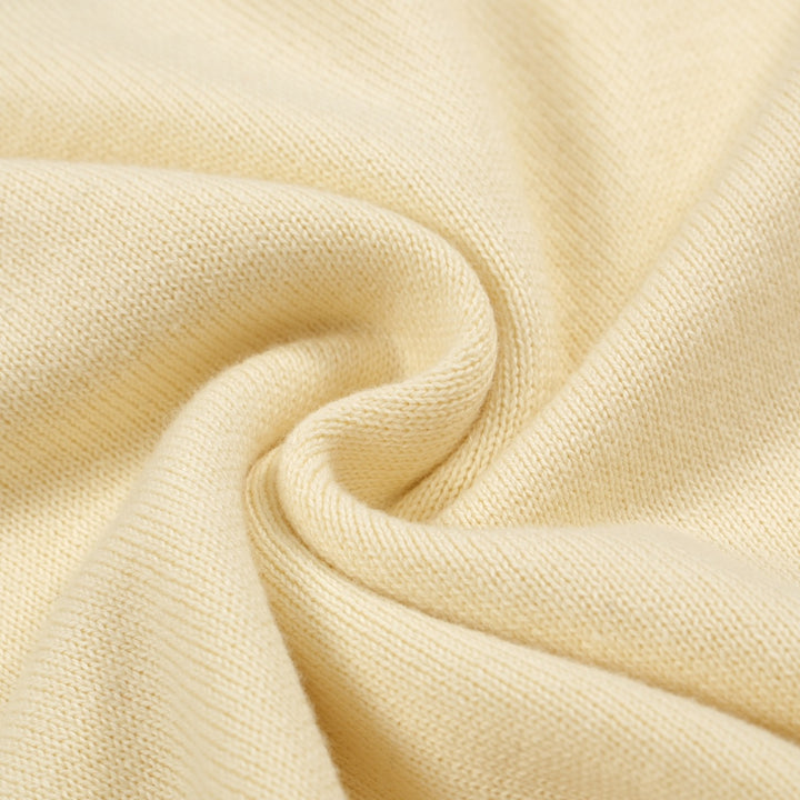 Camiseta feminina de malha amarelo claro com listra multicolorida