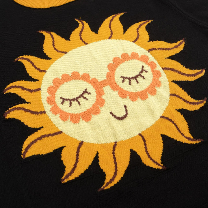 Camiseta feminina de malha preta com sol