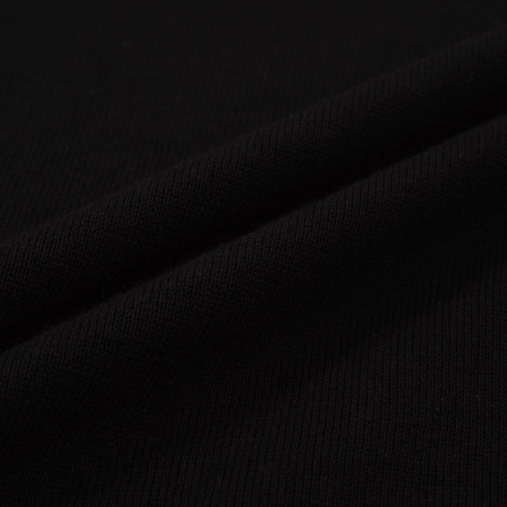 Retro Varsity stickad tröja för män – vintagesvart med vitrandiga detaljer