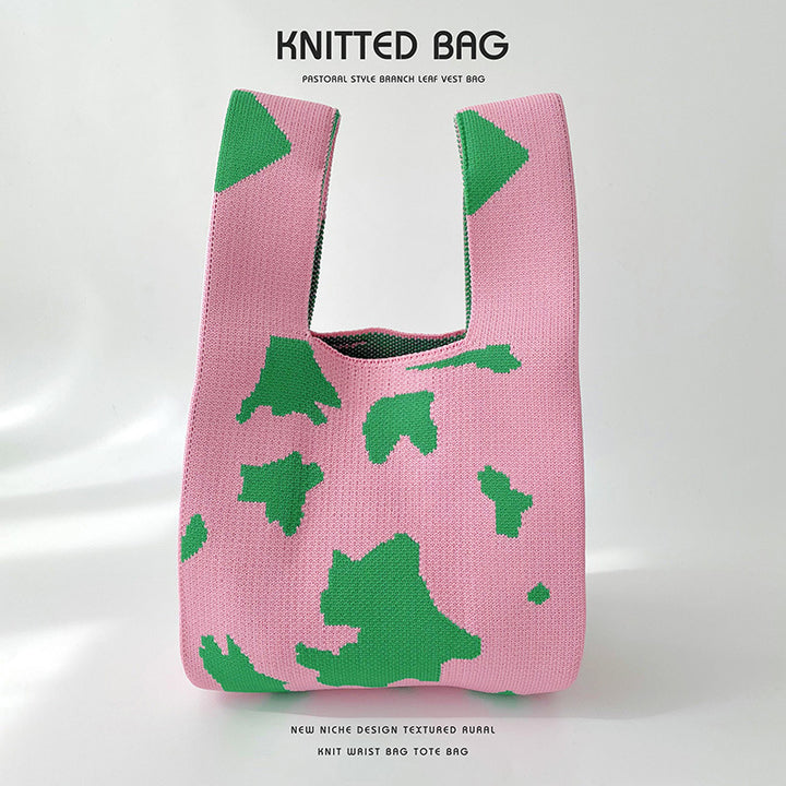 Gefleckte gestrickte Schultertasche