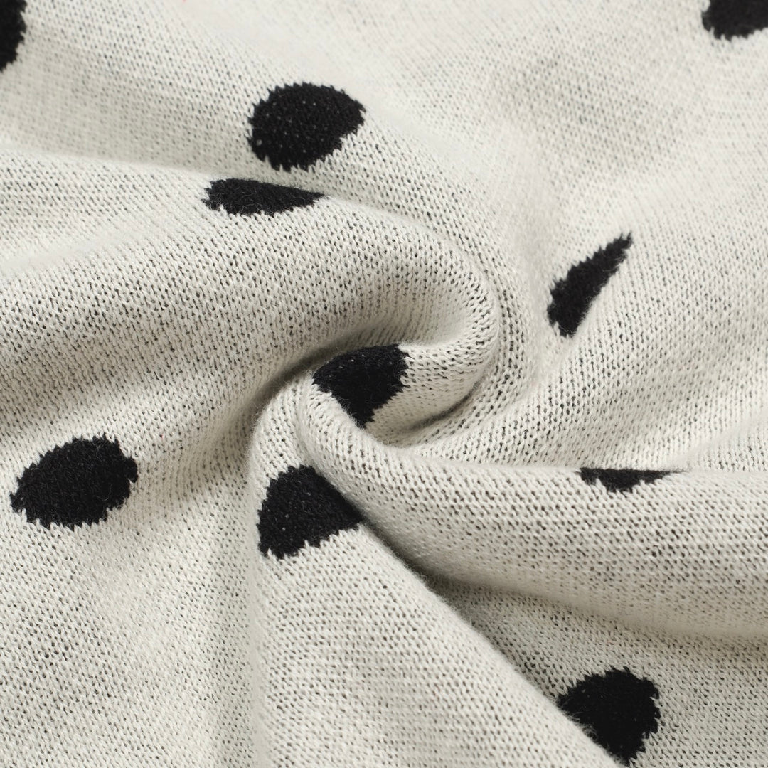 Cárdigan de punto retro de lunares blancos para mujeres