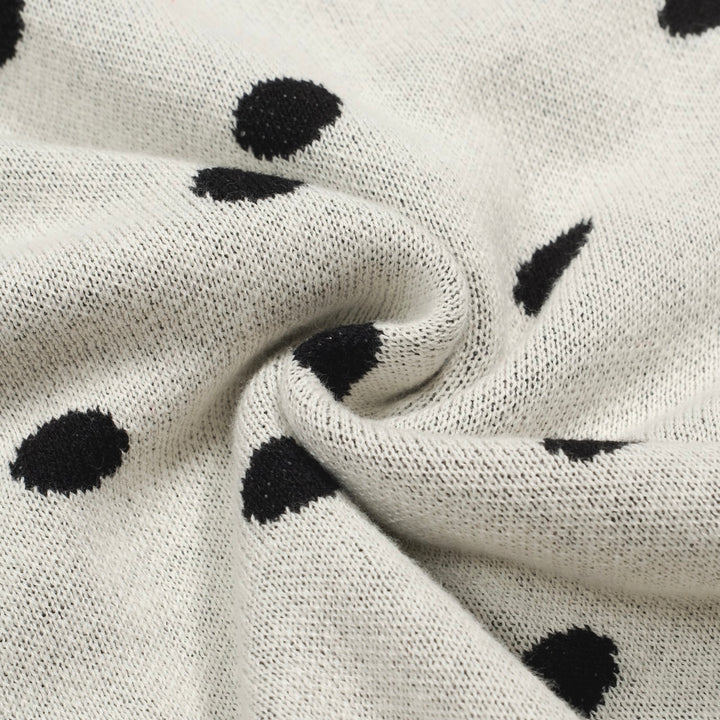 Cárdigan de punto retro de lunares blancos para mujeres