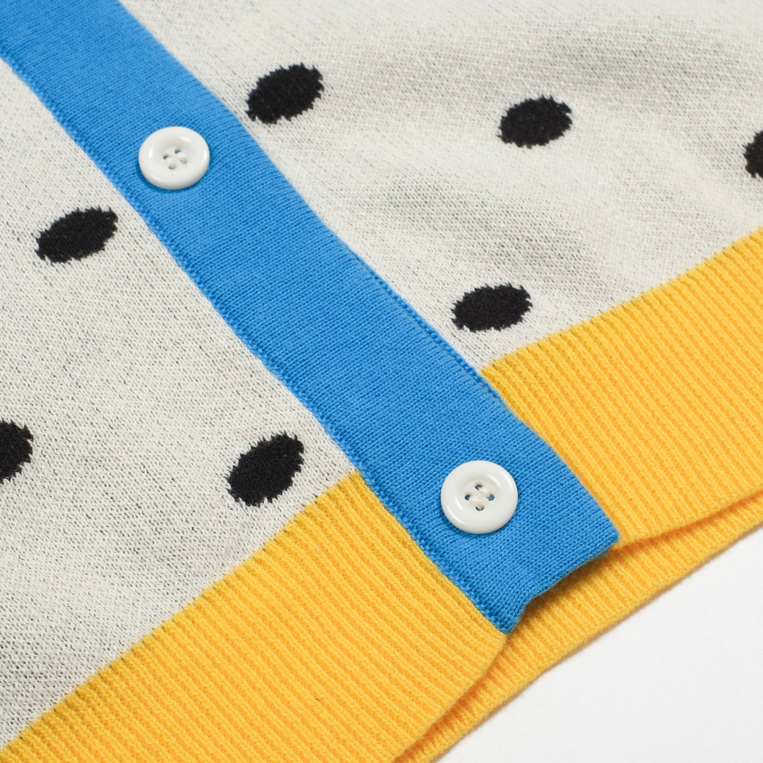 Cárdigan de punto retro de lunares blancos para mujeres