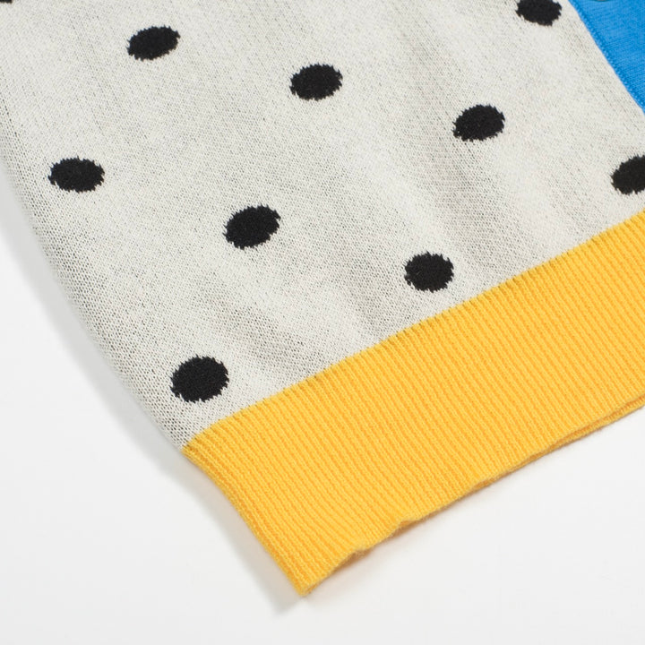 Cárdigan de punto retro de lunares blancos para mujeres