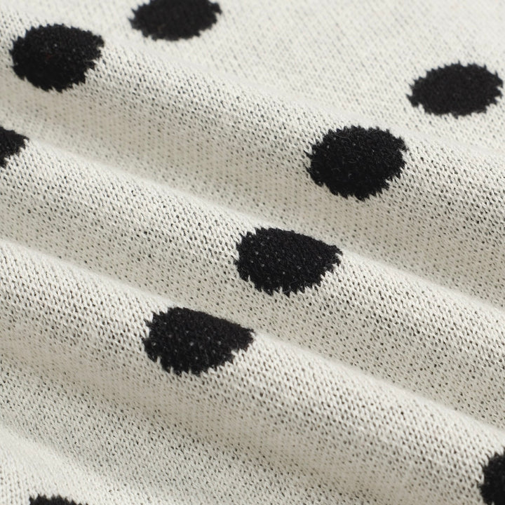 Cárdigan de punto retro de lunares blancos para mujeres