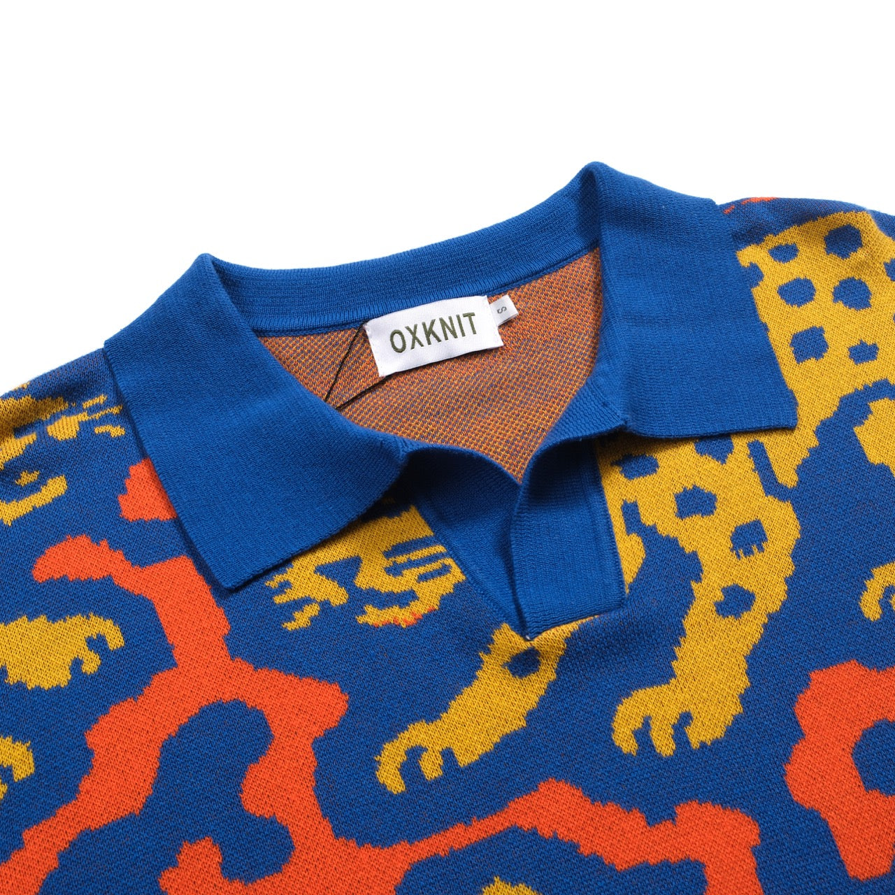 LEOPARD JACQUARD KNIT POLO SHIRT【BLUE】 Men's blue leopard jacquard V-neck knitted polo shirt – OXKnit