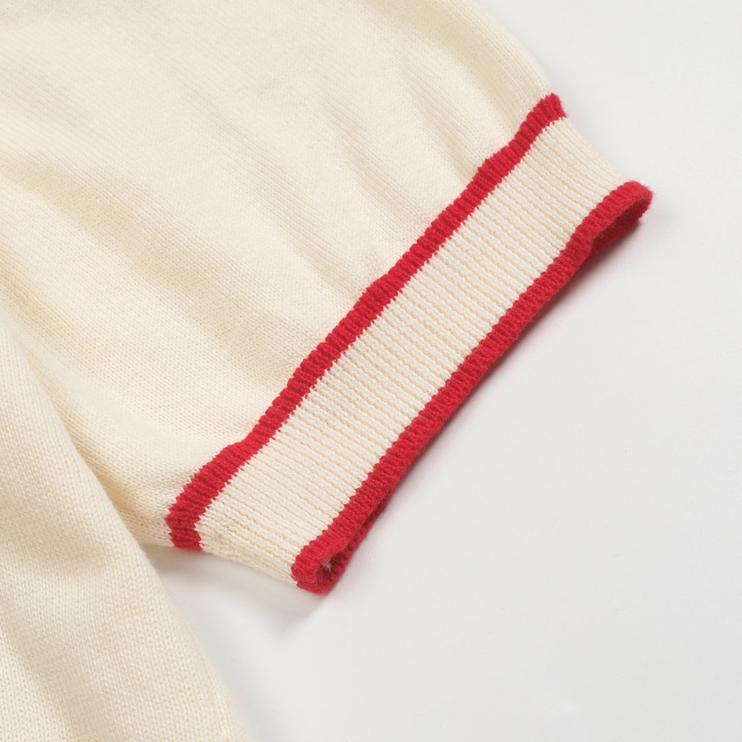 Weißes apricotfarbenes 1976-Strickpoloshirt mit V-Ausschnitt für Herren