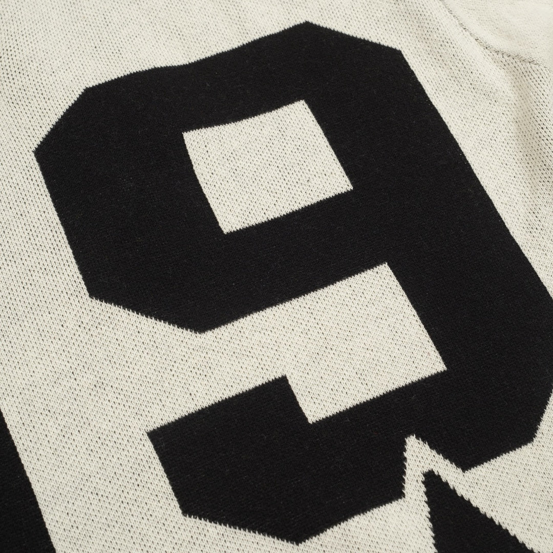 Beige typsnitt för män89" jacquard V-ringad pikétröja