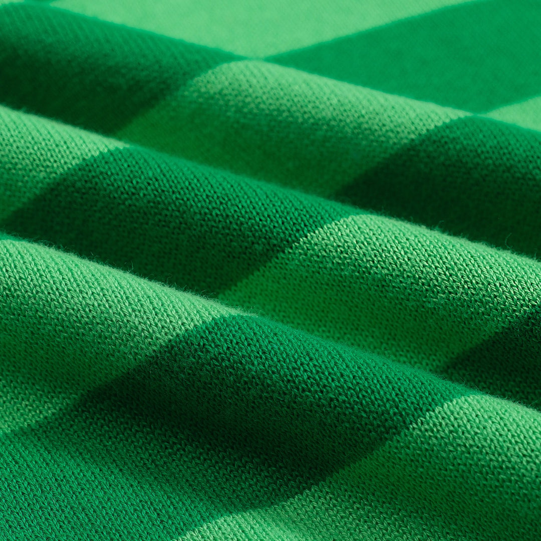 Polo da donna in maglia con maniche a sbuffo a righe verdi