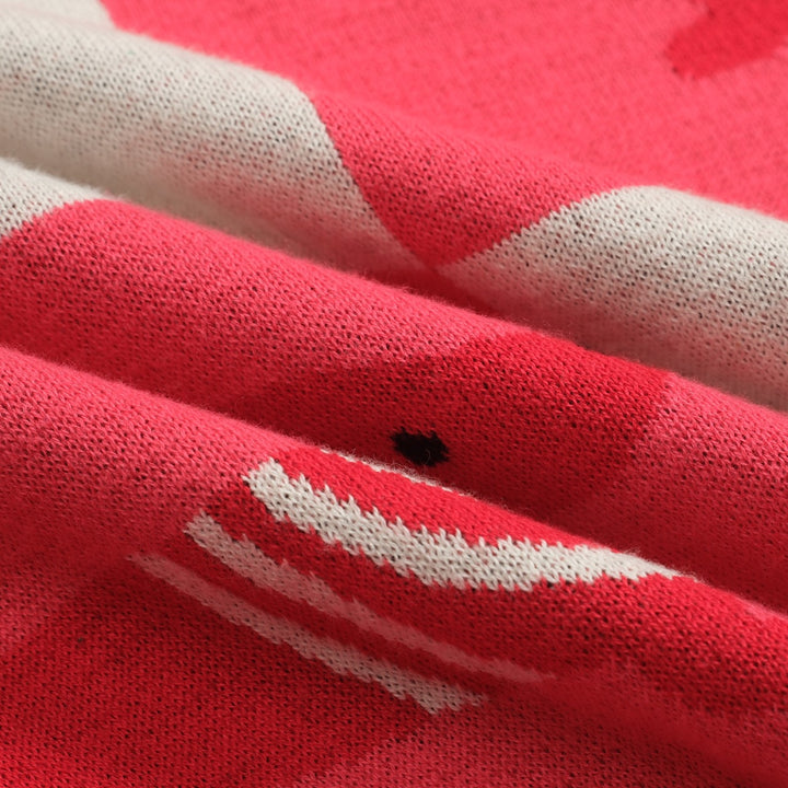 Pikétax i jacquardstickad V-ringad dam dam