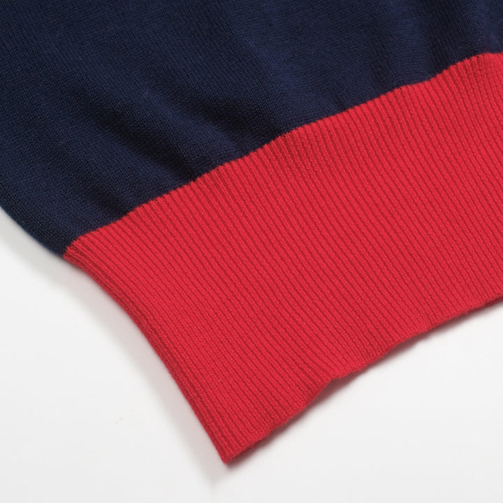 Mörkblå, regnbågsrandig stickad V-ringad dam