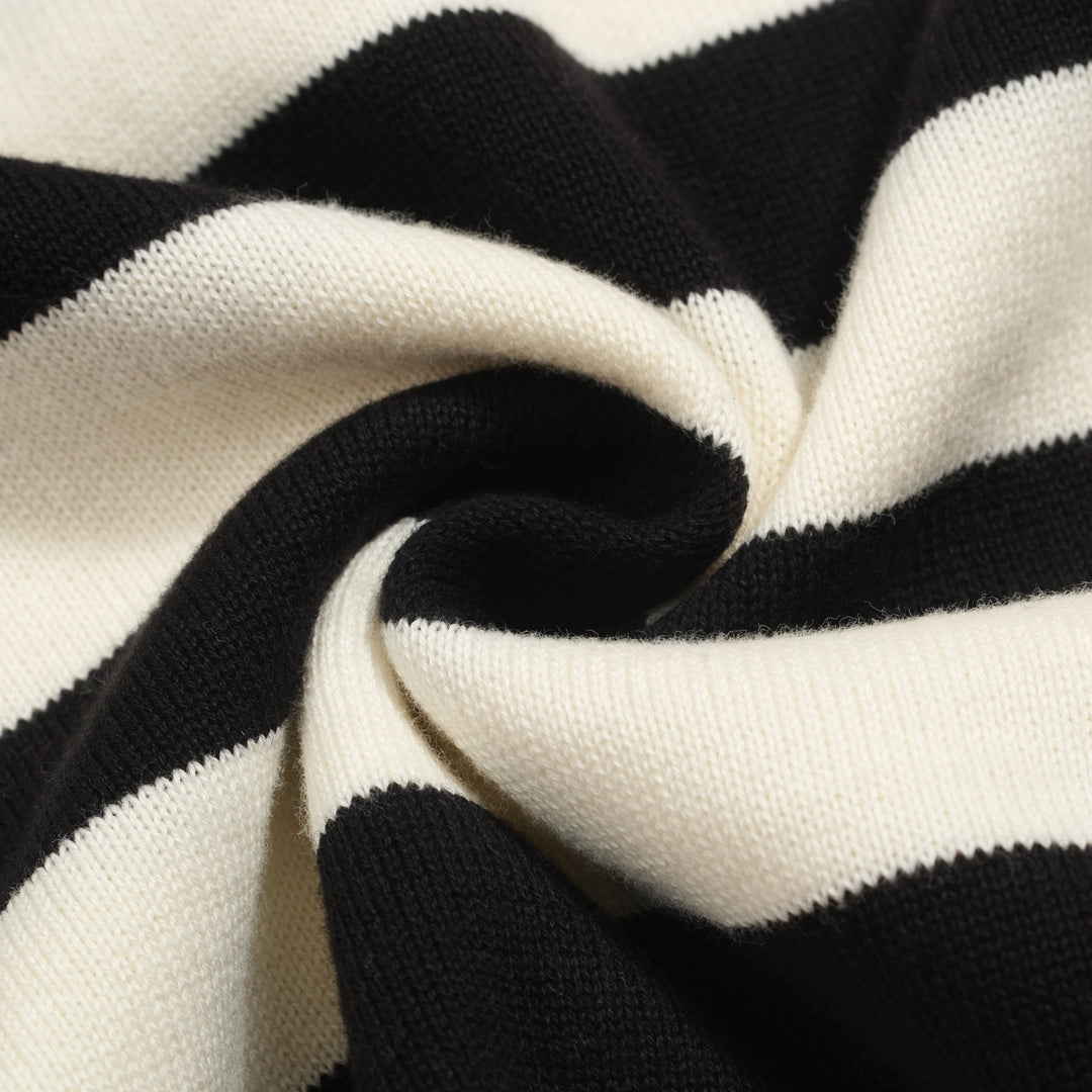 Polo de mujer de punto a rayas negro con manga burbuja