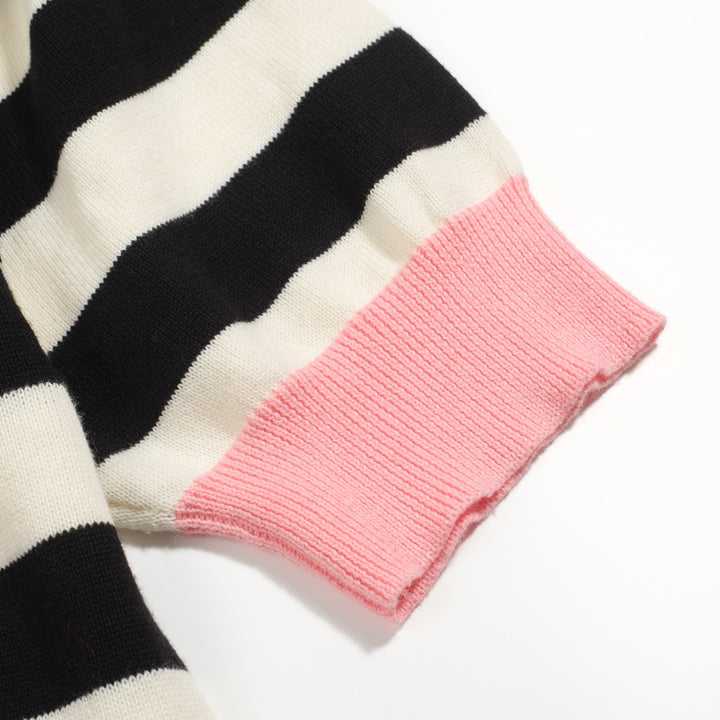 Polo de mujer de punto a rayas negro con manga burbuja