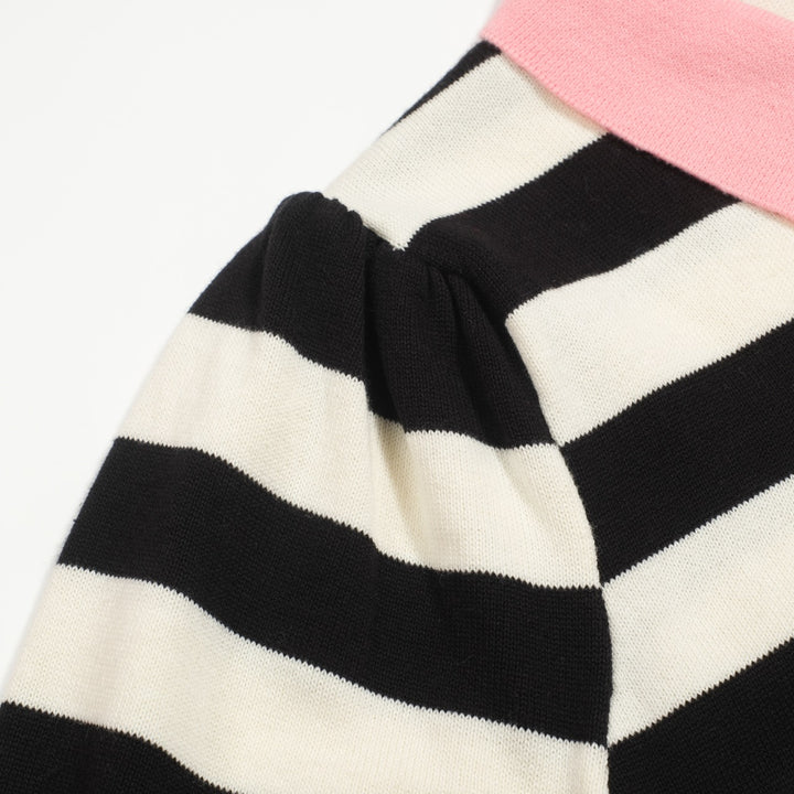 Polo de mujer de punto a rayas negro con manga burbuja