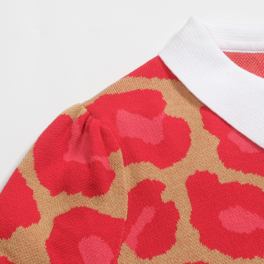 Leopardmönstrad pikétröja i jacquard med V-ringad dragkedja för kvinnor