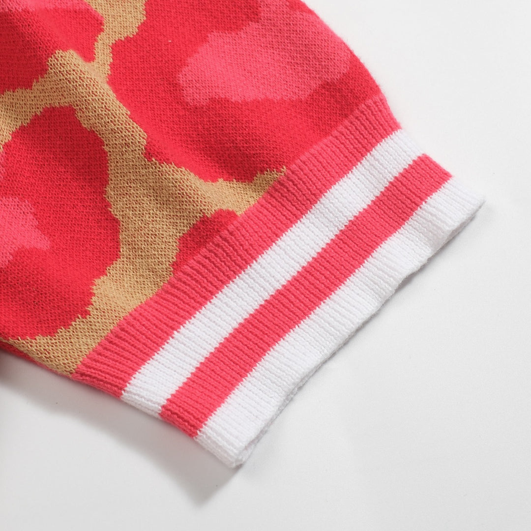 Leopardmönstrad pikétröja i jacquard med V-ringad dragkedja för kvinnor