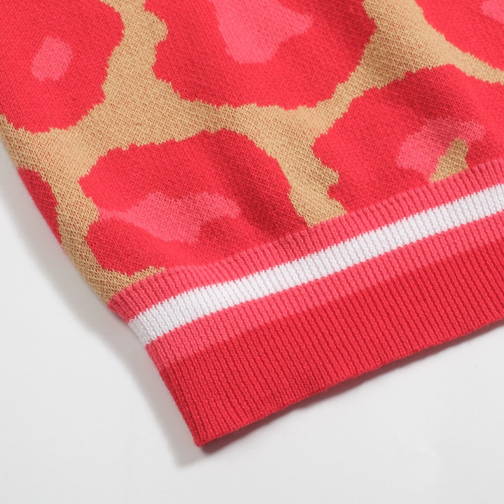 Leopardmönstrad pikétröja i jacquard med V-ringad dragkedja för kvinnor