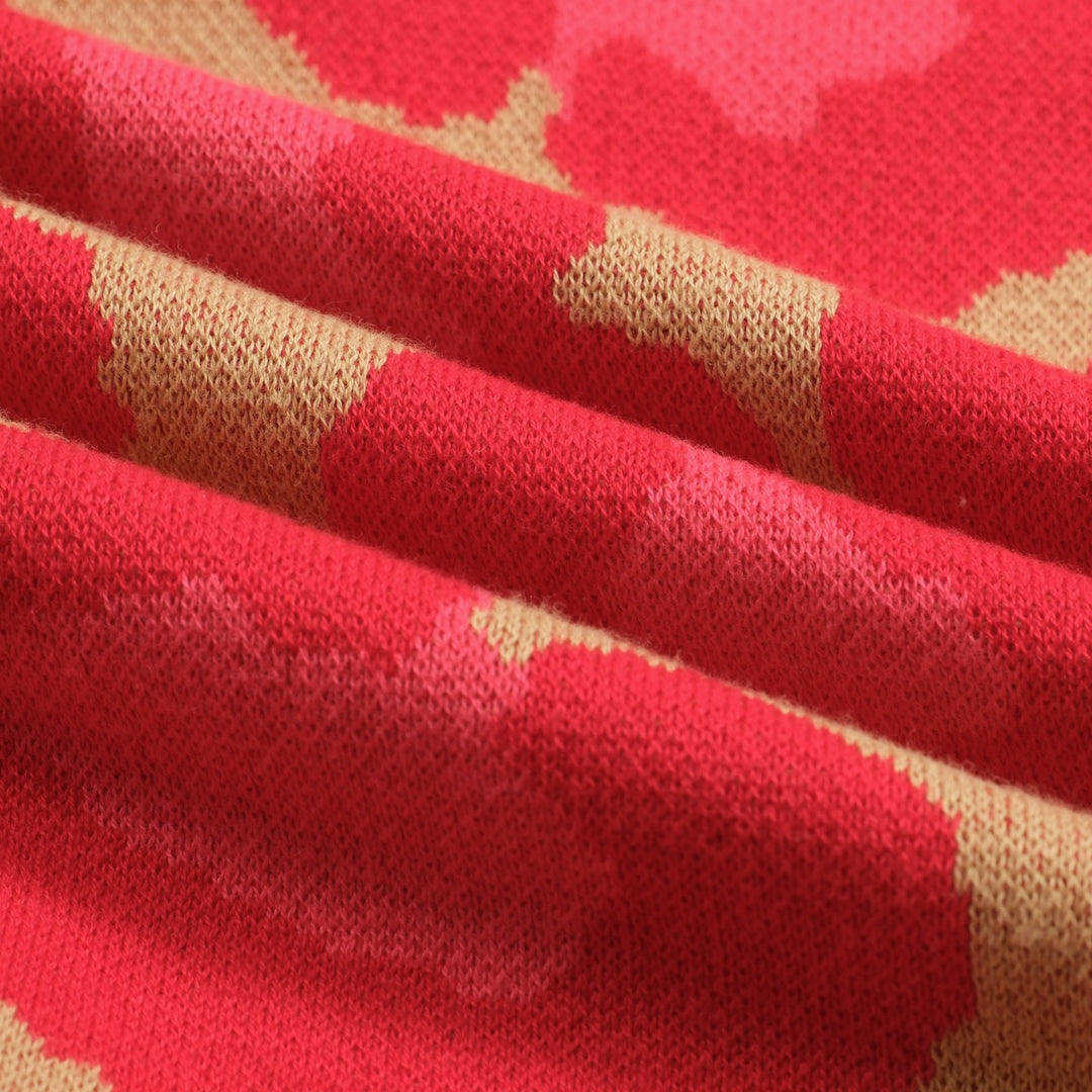 Leopardmönstrad pikétröja i jacquard med V-ringad dragkedja för kvinnor