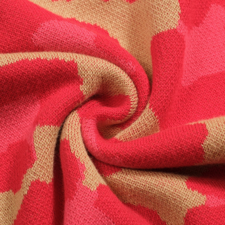 Leopardmönstrad pikétröja i jacquard med V-ringad dragkedja för kvinnor