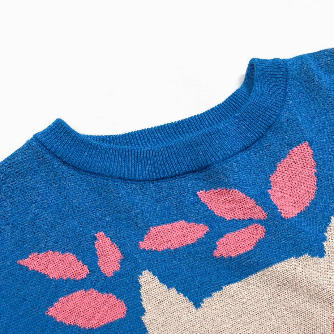 Kvinnors stickade plagg i blått fågeldjur i jacquard