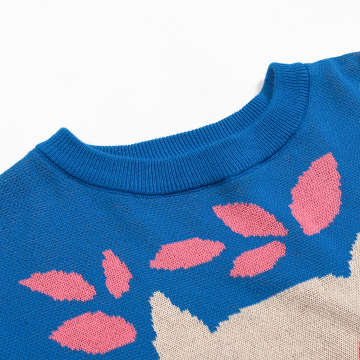 Kvinnors stickade plagg i blått fågeldjur i jacquard