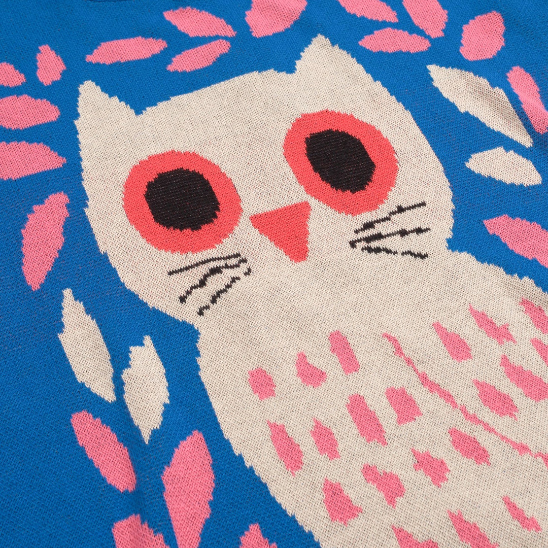 Kvinnors stickade plagg i blått fågeldjur i jacquard