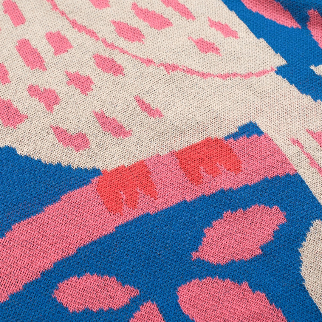 Kvinnors stickade plagg i blått fågeldjur i jacquard