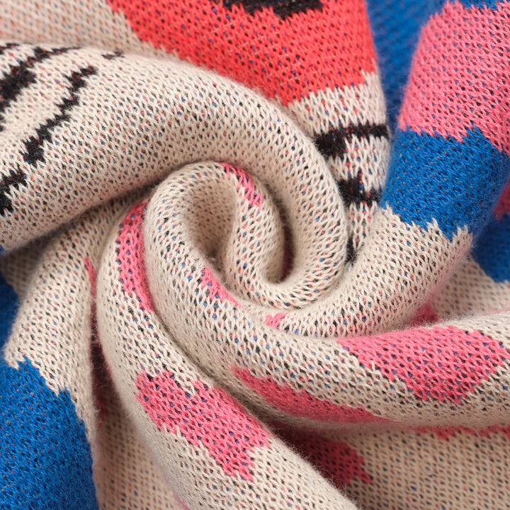 Kvinnors stickade plagg i blått fågeldjur i jacquard