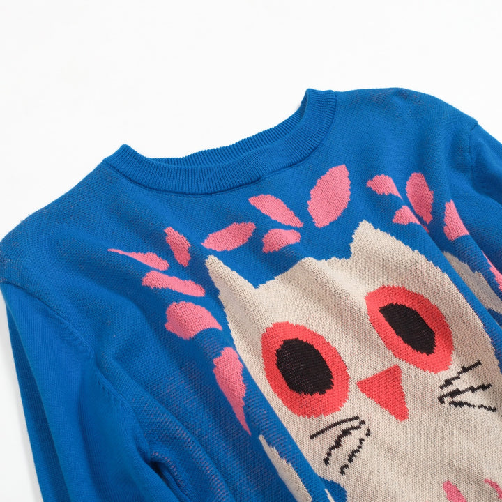 Kvinnors stickade plagg i blått fågeldjur i jacquard