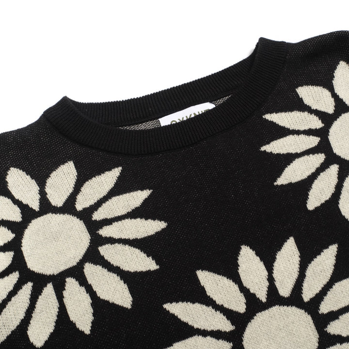Kvinnors stickade plagg med puffärm i svart solrosjacquard