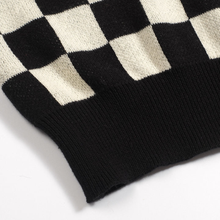 Kvinnors stickade plagg med puffärm i svart solrosjacquard