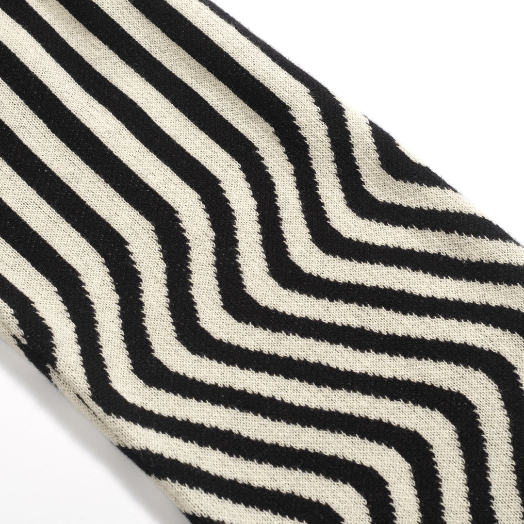 Kvinnors stickade plagg med puffärm i svart solrosjacquard