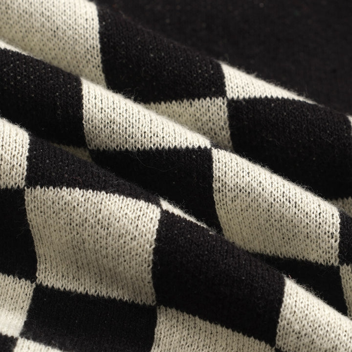 Kvinnors stickade plagg med puffärm i svart solrosjacquard