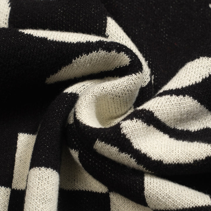 Kvinnors stickade plagg med puffärm i svart solrosjacquard